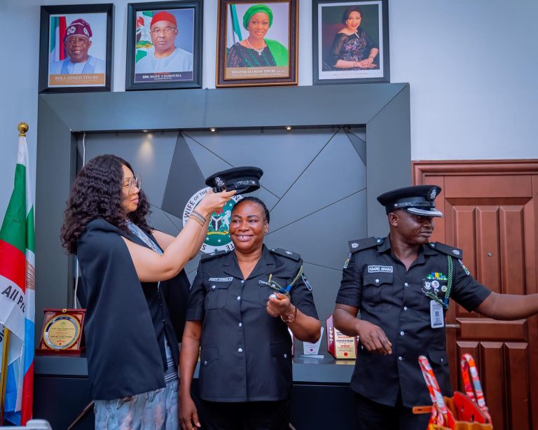 Imo State First Lady, HE Chioma Uzodimma decorates her newly promoted ADC